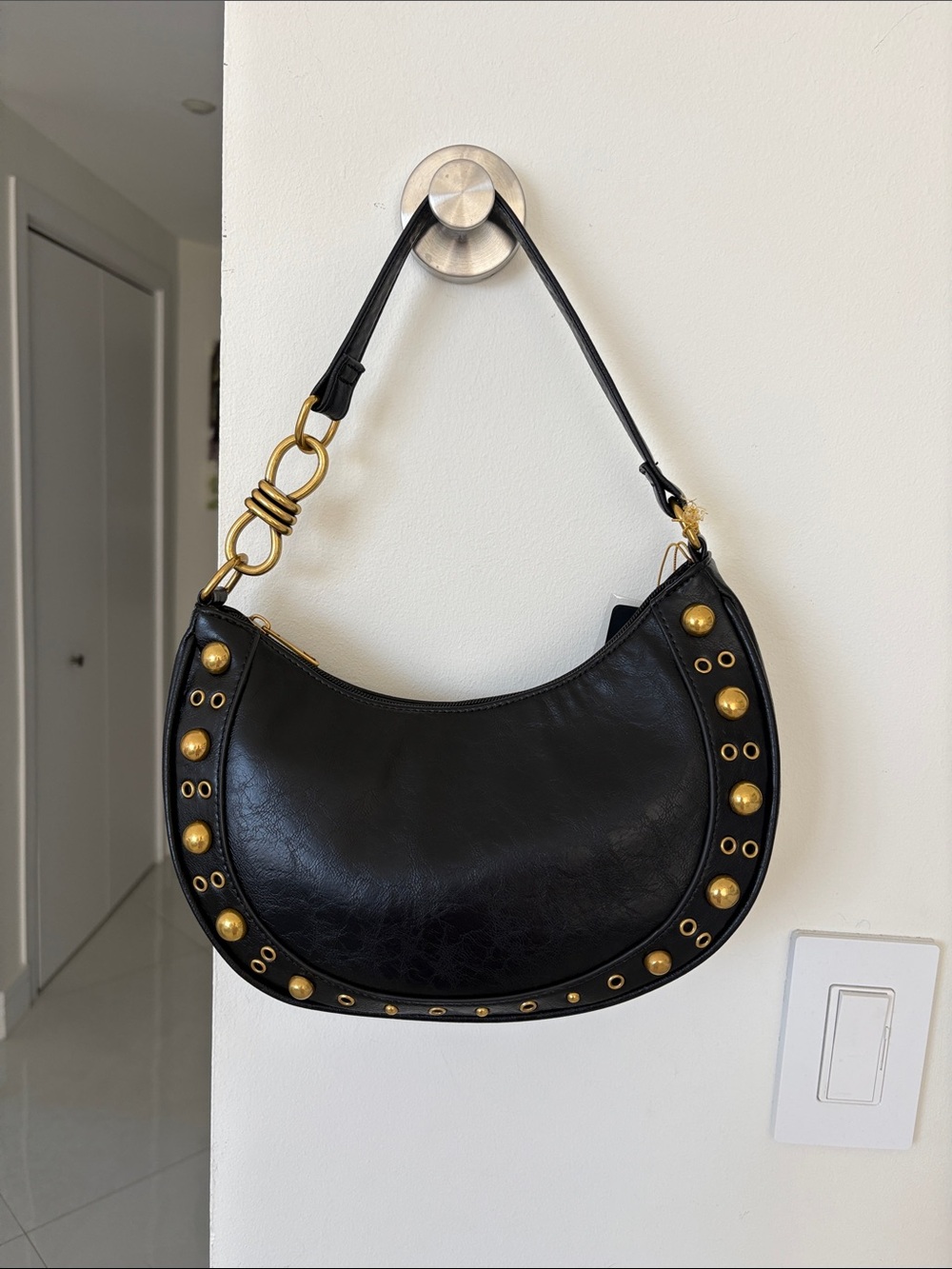 Black Leather Crescent Shoulder Bag with Gold Stud Detailing